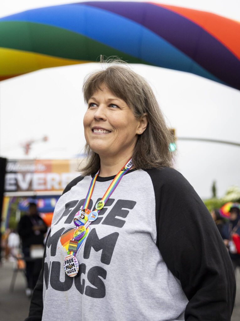 Debbie Welch, a “proud mom of two queer children,” poses for a portrait during the Everett Pride Block Party on Saturday, June 21, 2025 in Everett, Washington. (Olivia Vanni / The Herald)
