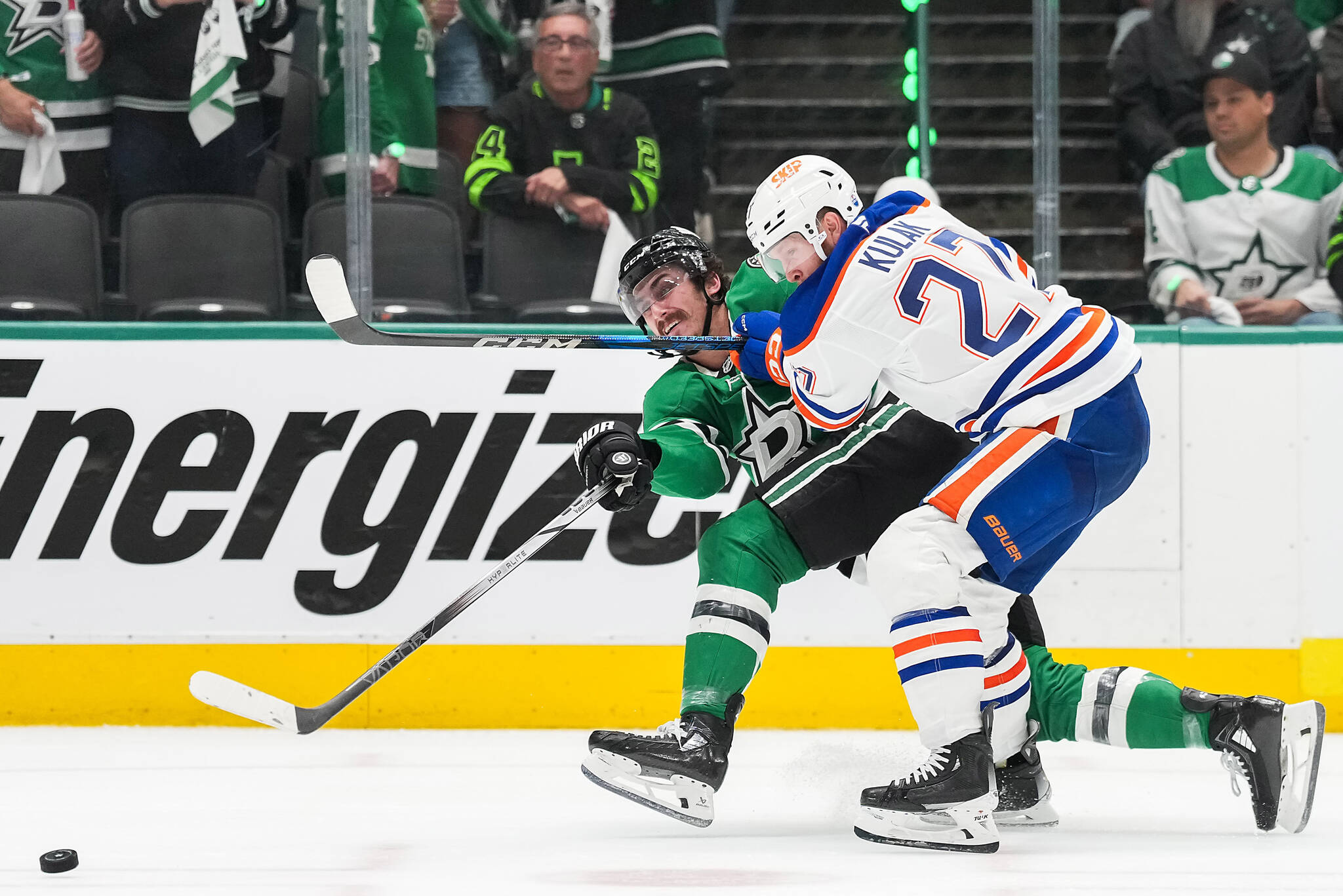 Dallas Stars left wing Mason Marchment passes the puck as Edmonton Oilers defenseman Brett Kulak (27) applies pressure during the third period in Game 1 of Western Conference finals on May 21, 2025, in Dallas. (Smiley N. Pool / The Dallas Morning News / Tribune News Services)
