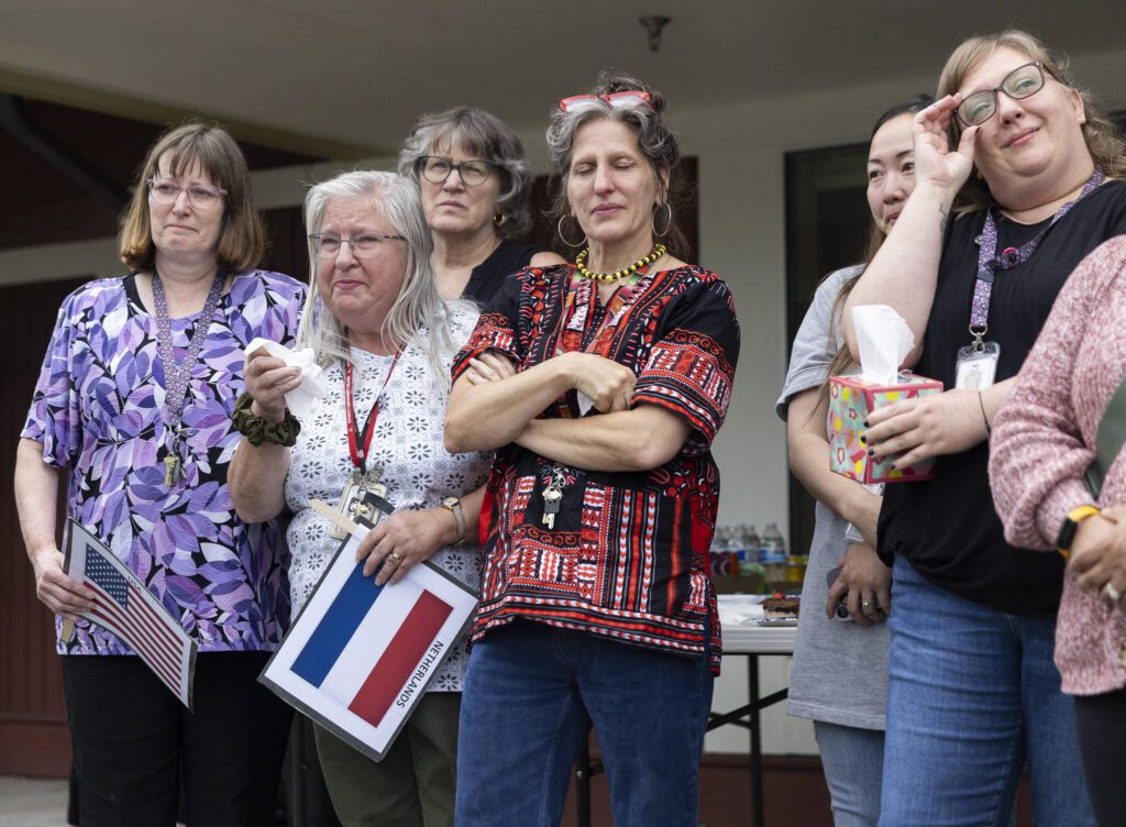 Early Learning Center teachers and staff become emotional as people thank them for their time and dedication on Wednesday, June 25, 2025 in Everett, Washington. (Olivia Vanni / The Herald)
