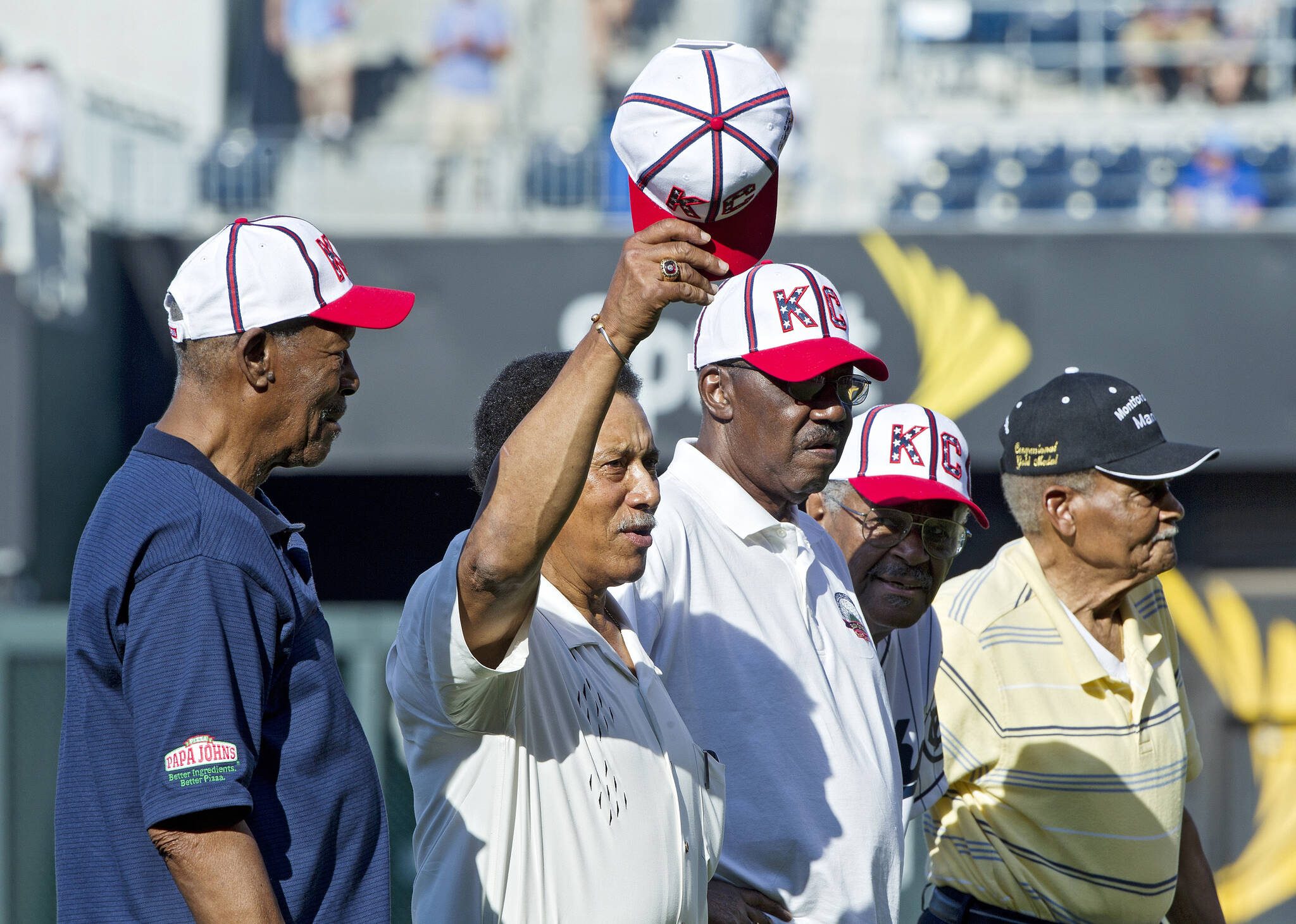 Former Negro League players Ulysses Hollimon, from left, Diego Segui, Earnest Johnson, Jesse Rogers and Bob Motley are introduced before a game between the Minnesota Twins and Kansas City Royals in Kansas City, Missouri, on Saturday, July 21, 2012. (John Sleezer / Kansas City Star / Tribune News Services)