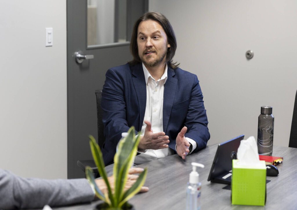Chief Behavioral Health Officer Levi Van Dyke talks about the direct impact federal cuts will have on those that need the national LGBTQ+ youth suicide hotline on Monday, June 30, 2025 in Everett, Washington. (Olivia Vanni / The Herald)

