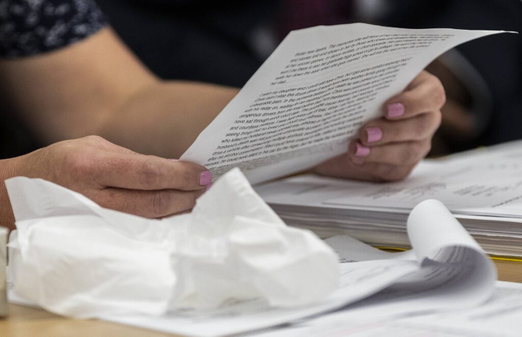 A victim advocate reads the statement of wife Cammryn Gadd during the sentencing hearing for Raul Benitez Santana at the Snohomish County Courthouse on Wednesday, July 2, 2025 in Everett, Washington. (Olivia Vanni / The Herald)
