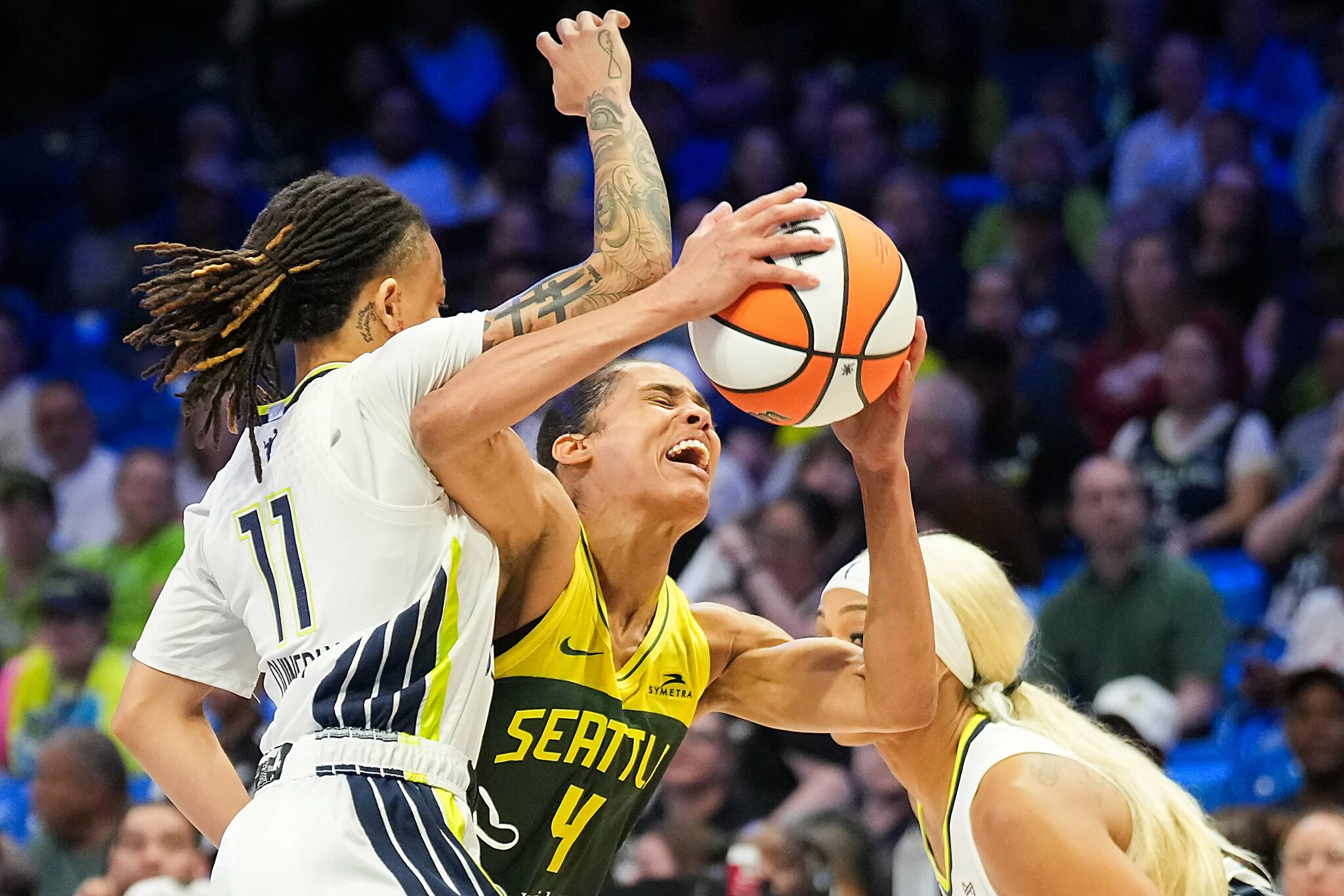 Seattle Storm guard Skylar Diggins (4) tries to drive past Dallas Wings guard JJ Quinerly (11) during the first half of a WNBA basketball game at College Park Center on Monday, May 19, 2025, in Arlington, Texas. (Photo courtesy of the Seattle Storm)