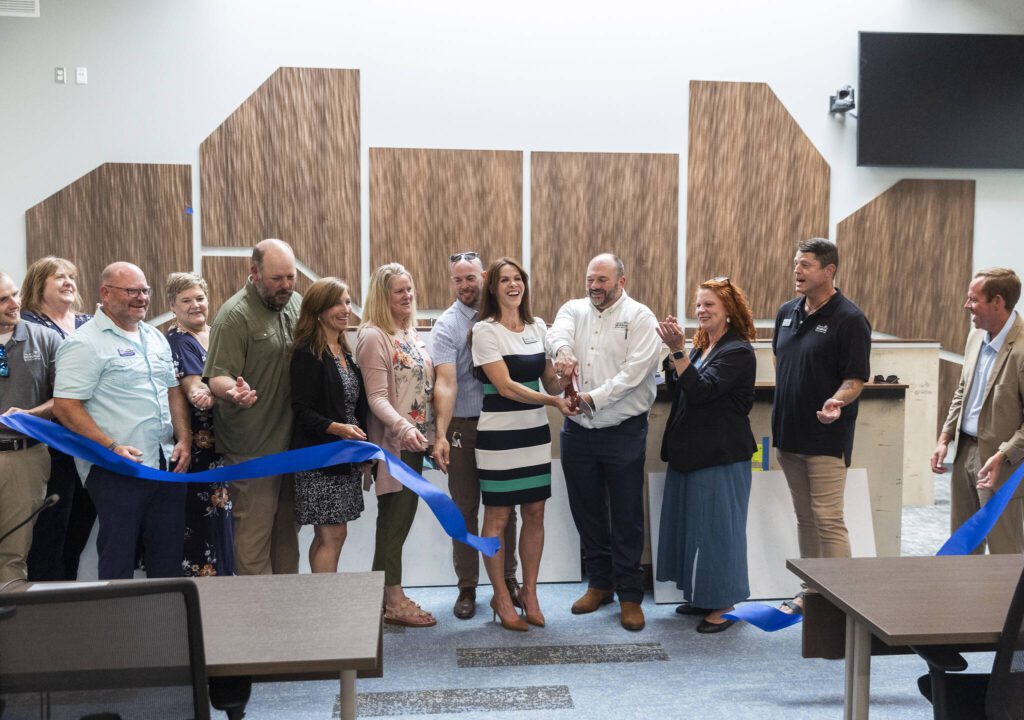 Municipal Court Judge Jessica Ness cuts the ribbon in the new courtroom on Monday, July 14, 2025 in Monroe, Washington. (Olivia Vanni / The Herald)
