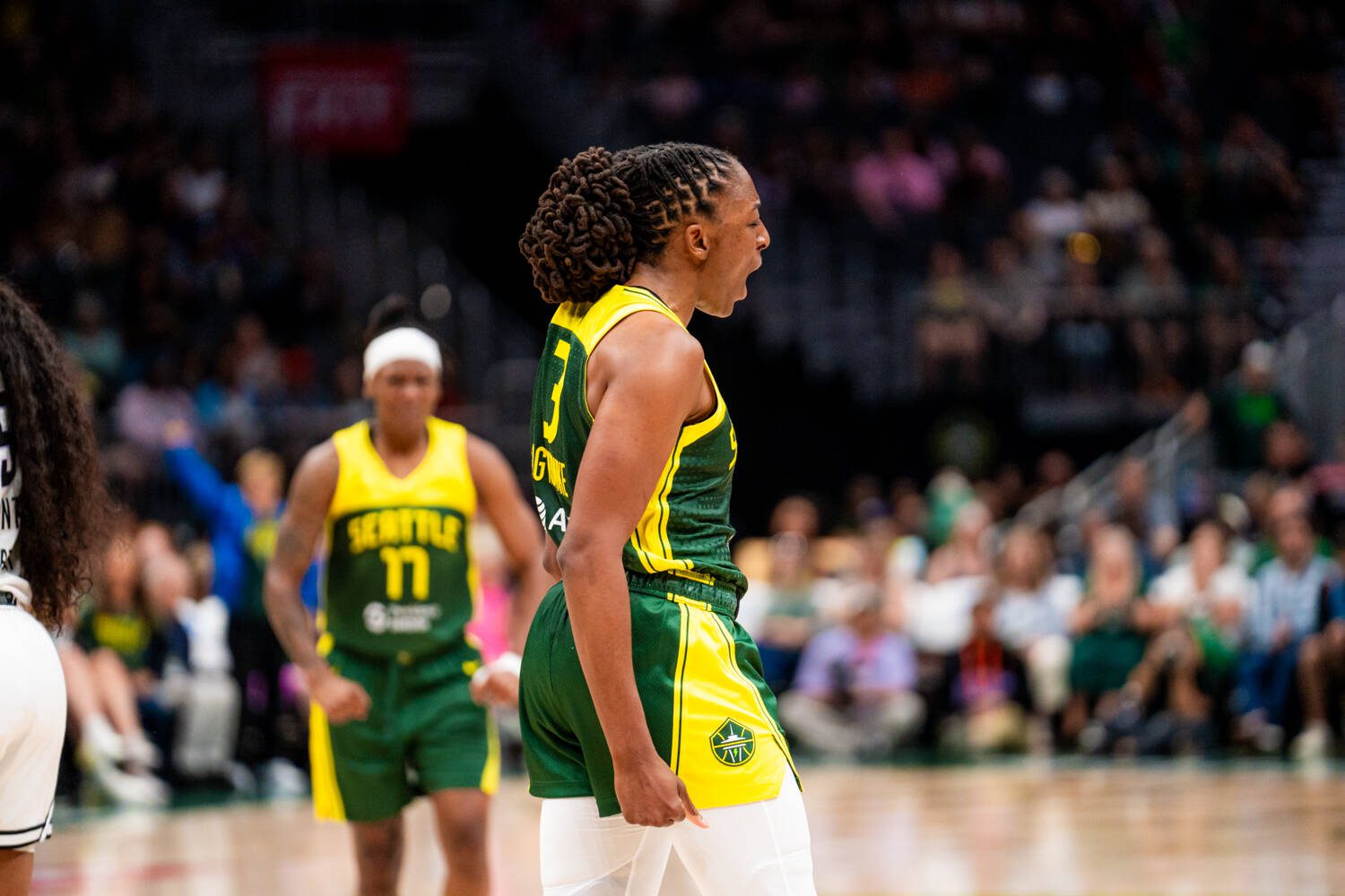 Nneka Ogwumike (3) celebrates as Erica Wheeler (17) looks on during a game against the Golden State Valkyries on July 16, 2025 at Climate Pledge Arena. (Courtesy of Seattle Storm)