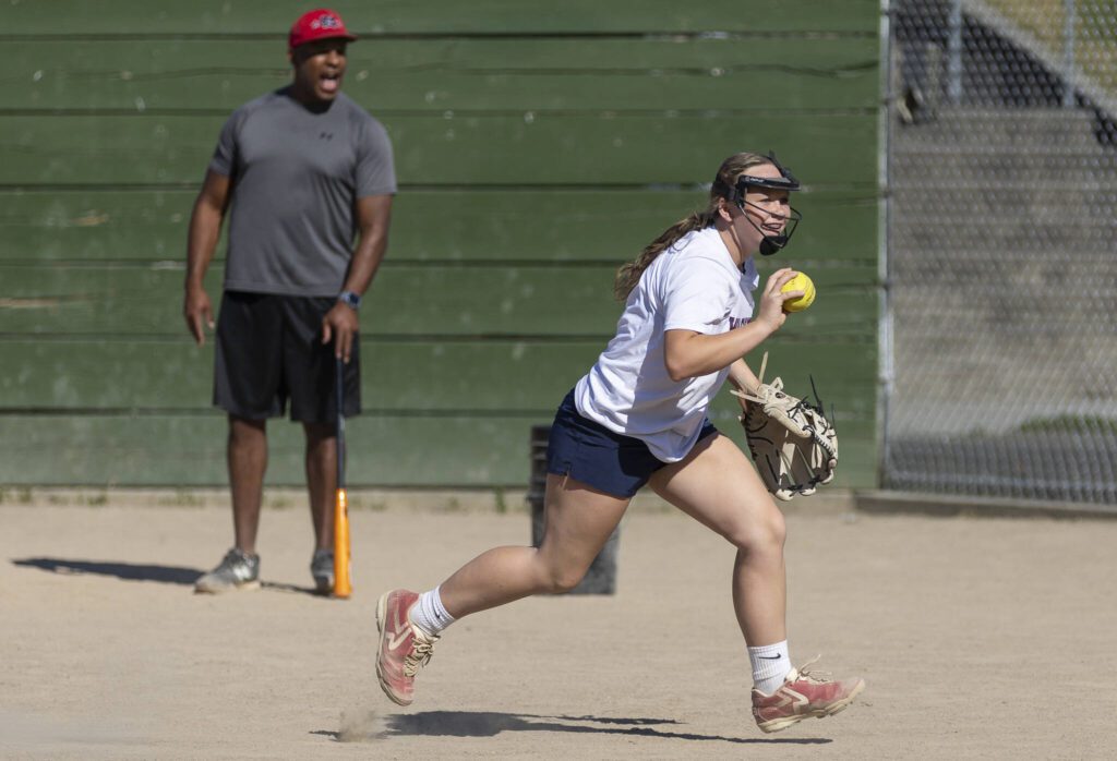 Daphnee Calsyn, 12, smiles as she runs through a drill during practice on Wednesday, July 16, 2025 in Mill Creek, Washington. (Olivia Vanni / The Herald)
