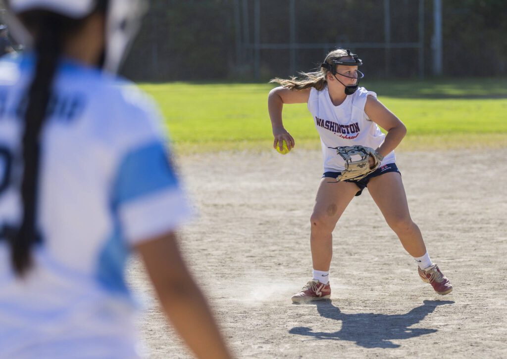 Daphnee Calsyn, 12, runs through an infield drills during practice on Wednesday, July 16, 2025 in Mill Creek, Washington. (Olivia Vanni / The Herald)
