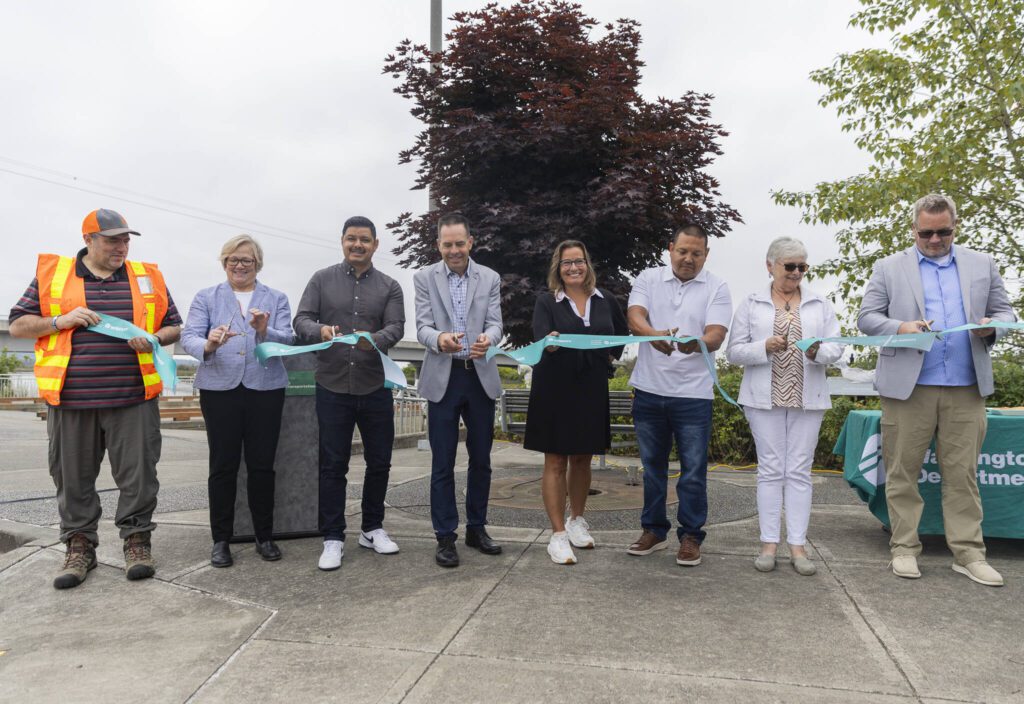 Marysville Mayor Jon Nehring and others cut a ribbon to celebrate the new I-5/SR529 interchange on Tuesday, July 22, 2025 in Marysville, Washington. (Olivia Vanni / The Herald)
