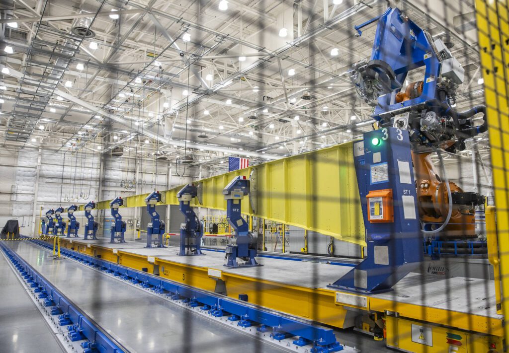 The 777-8 Freighter wing spar sits on the production line on Monday, July 21, 2025 in Everett, Washington. (Olivia Vanni / The Herald)
