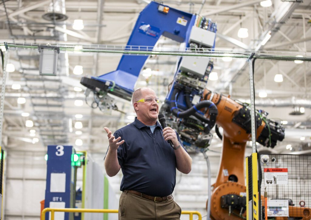 Ben Linder, 777 and 777-8 Freighter vice president and chief project engineer, speaks during an event held to kick off production of the 777-8 Freighter on Monday, July 21, 2025 in Everett, Washington. (Olivia Vanni / The Herald)
