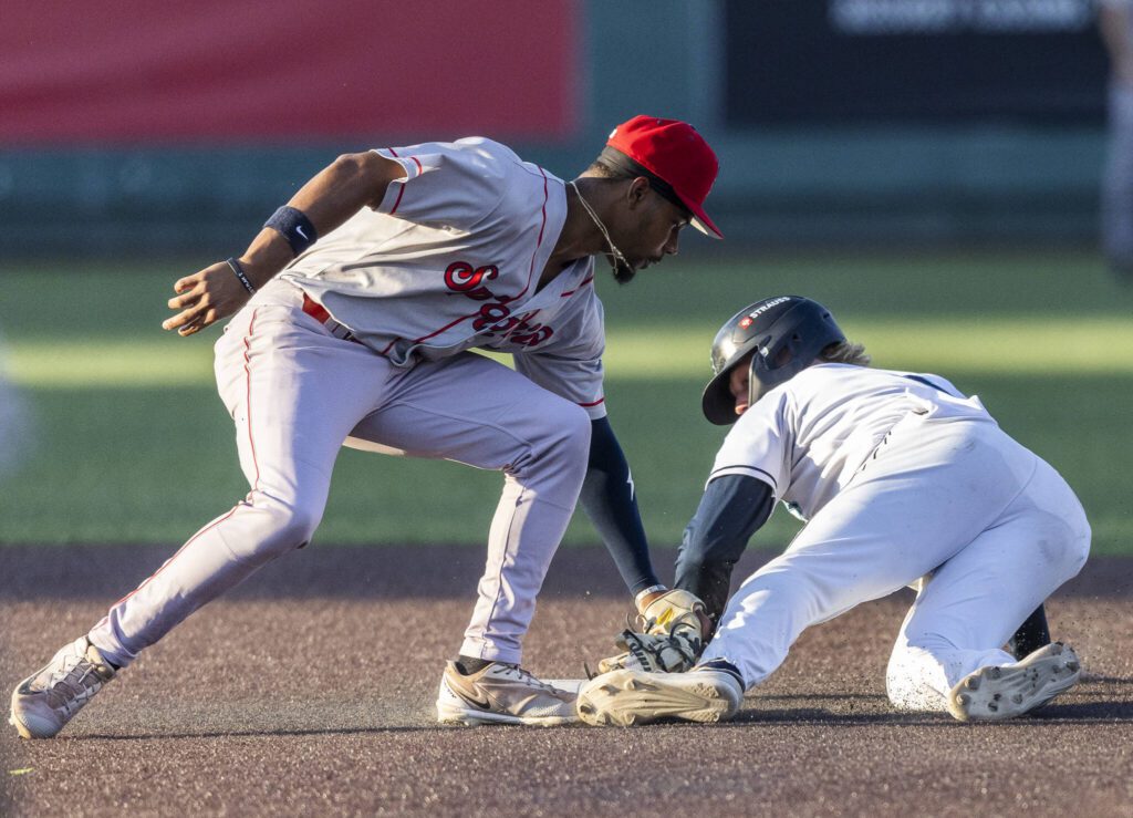Everett AquaSox outfielder Colin Davis steals second base during the game against the Spokane Indians on Tuesday, July 22, 2025 in Everett, Washington. (Olivia Vanni / The Herald)
