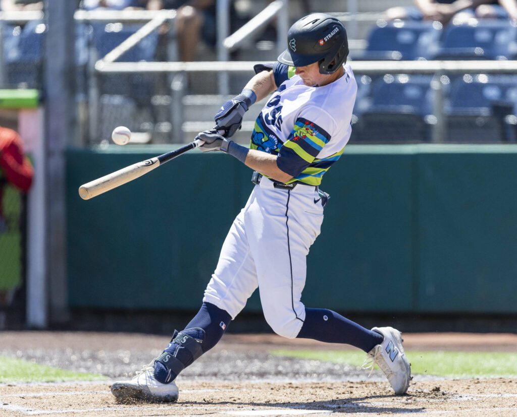 Everett AquaSox infielder Colt Emerson gets a hit during the game against the Spokane Indians on Thursday, July 24, 2025 in Everett, Washington. (Olivia Vanni / The Herald)
