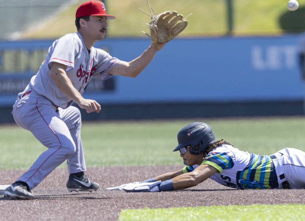 Everett AquaSox outfielder Tai Peete slides into second base during the game against the Spokane Indians on Thursday, July 24, 2025 in Everett, Washington. (Olivia Vanni / The Herald)
