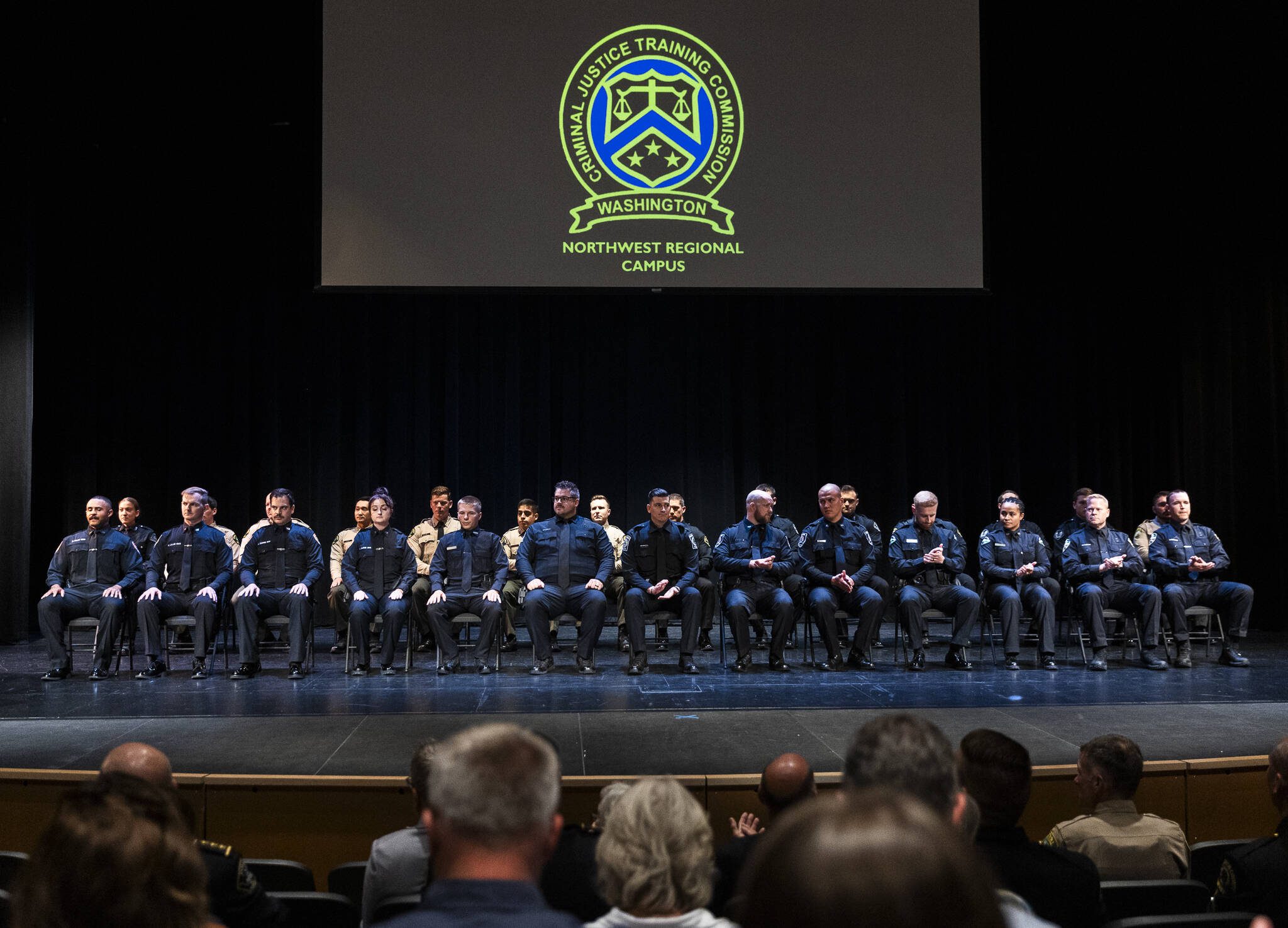 The Washington State Criminal Justice Training Commission (WSCJTC) graduation of Basic Law Enforcement Academy (BLEA) Class 915 on Tuesday, July 29, 2025, in Arlington, Washington. This is the first class to complete training at the agency’s new Northwest Regional Campus in Arlington. (Olivia Vanni / The Herald)