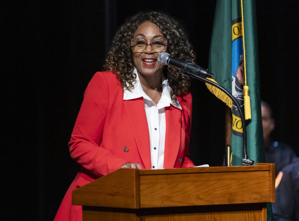 Executive Director Monica Alexander speaks at the graduation of Basic Law Enforcement Academy’s Class 915 on Tuesday, July 29, 2025 in Arlington, Washington. (Olivia Vanni / The Herald)
