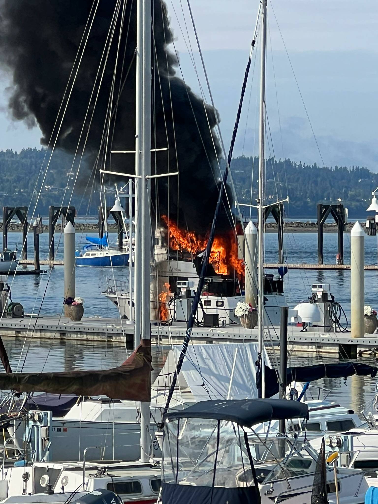 Flames engulf 32-foot boat at the Everett Marina fuel dock on Friday, Aug. 1, 2022, in Everett, Washington. (Everett Fire Department)