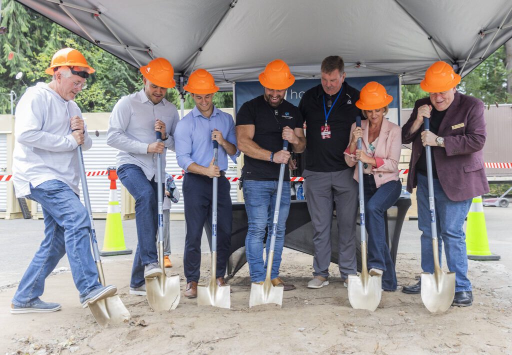 Community members and Hope Creek staff break ground for the new Mill Creek Community Food Bank site on Monday, Aug. 4, 2025 in Mill Creek, Washington. (Olivia Vanni / The Herald)

