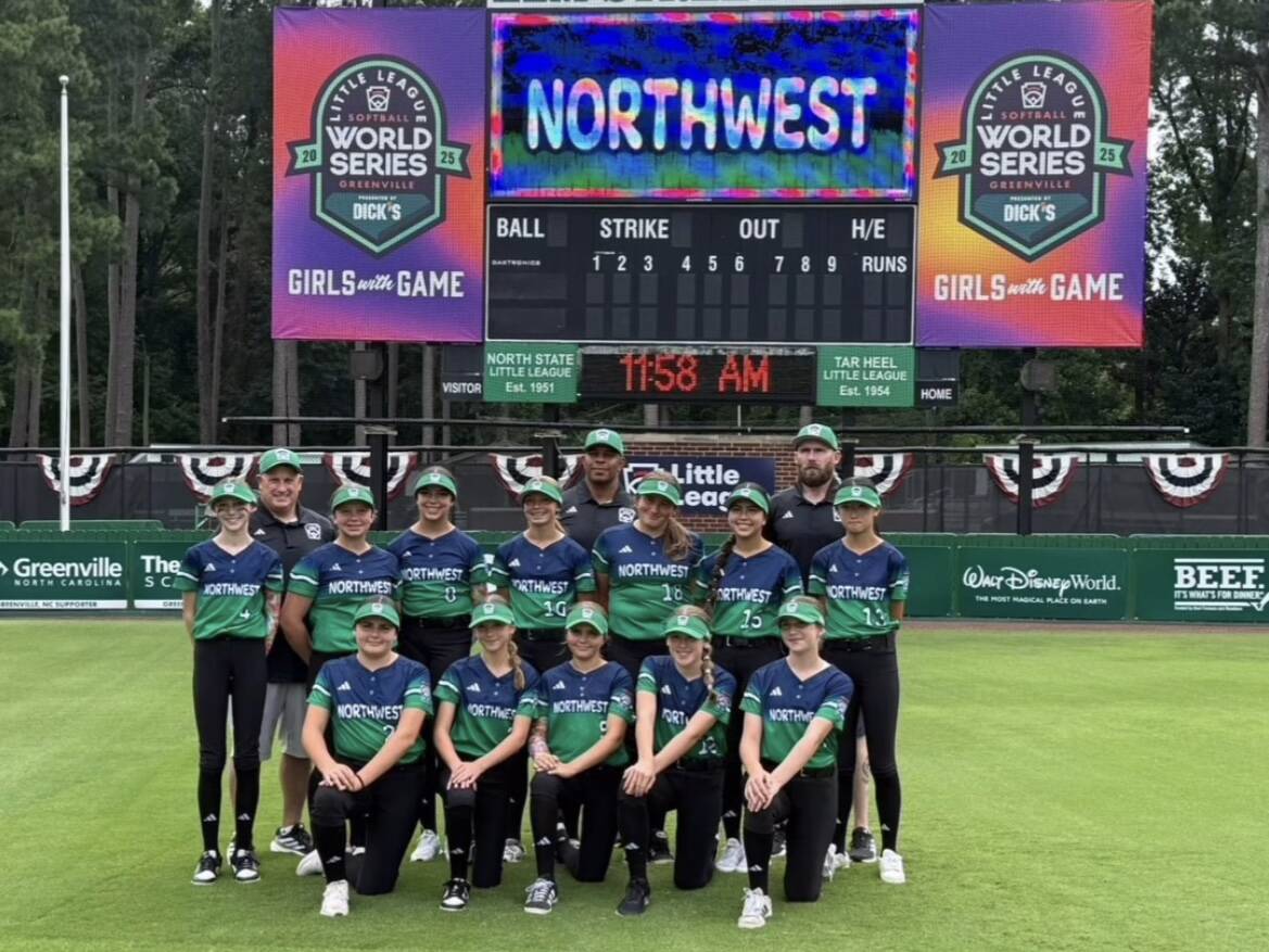 The Mill Creek Little League All-Star softball team poses at Stallings Stadium in Greenville N.C. as it prepared to open the Little League World Series. (Photo courtesty of Mill Creek Little League)