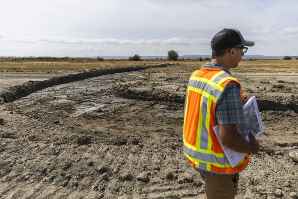 The outline of a channel is visible along the surface on Monday, Aug. 4, 2025 in Stanwood, Washington. (Olivia Vanni / The Herald)
