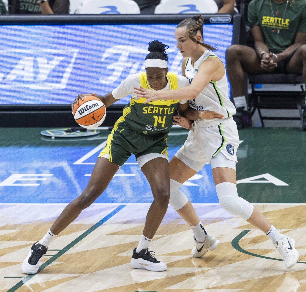 Seattle Storm&rsquo;s Dominique Malonga tries to maneuver toward the basket during the game against the Minnesota Lynx on Tuesday, Aug. 5, 2025 in Seattle, Washington. (Olivia Vanni / The Herald)
