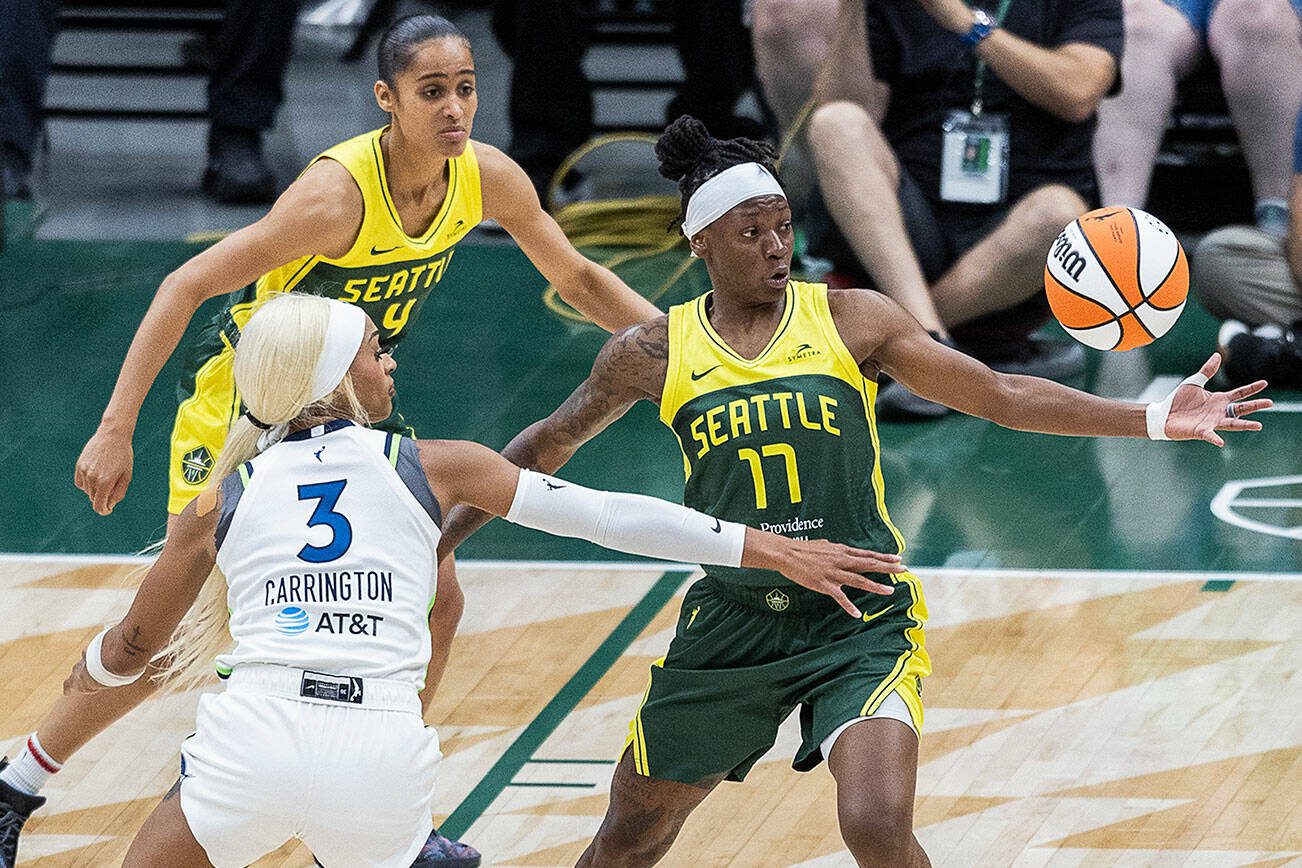 Seattle Storm’s Erica Wheeler reaches up for a loose ball during the game against the Minnesota Lynx on Tuesday, Aug. 5, 2025 in Seattle, Washington. (Olivia Vanni / The Herald)