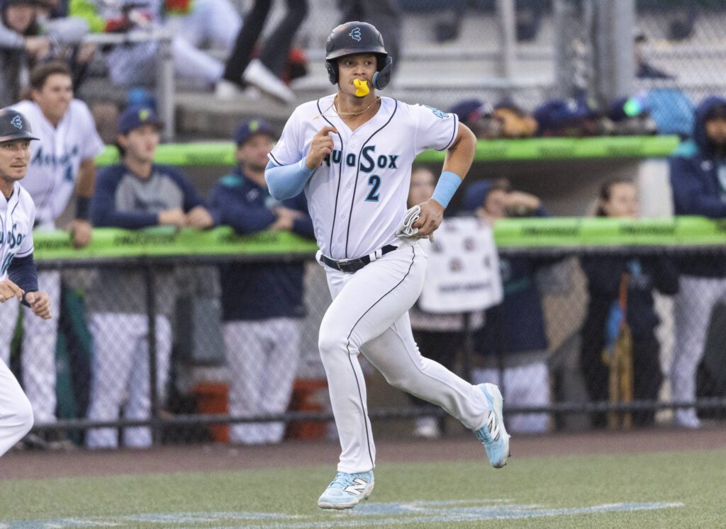 Everett AquaSox infielder Luis Suisbel runs to home plate to score during the game against the Spokane Indians on Tuesday, Aug. 19, 2025 in Everett, Washington. (Olivia Vanni / The Herald)

