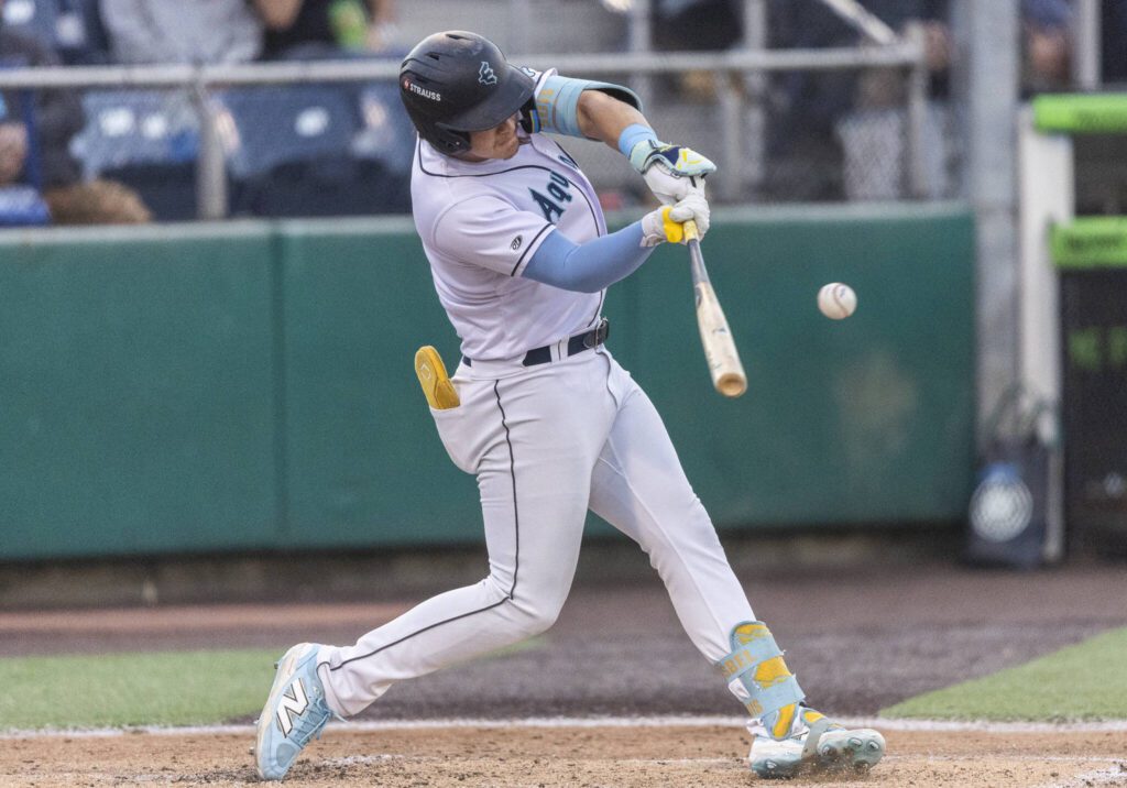Everett AquaSox infielder Luis Suisbel gets a hit during the game against the Spokane Indians on Tuesday, Aug. 19, 2025 in Everett, Washington. (Olivia Vanni / The Herald)
