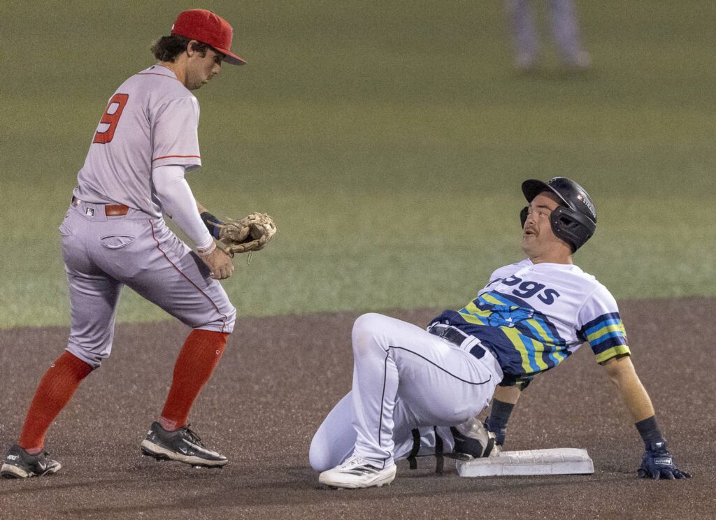 Everett AquaSox catcher Matthew Ellis smiles after almost sliding off of second base during the game against the Spokane Indians on Wednesday, Aug. 20, 2025 in Everett, Washington. (Olivia Vanni / The Herald)
