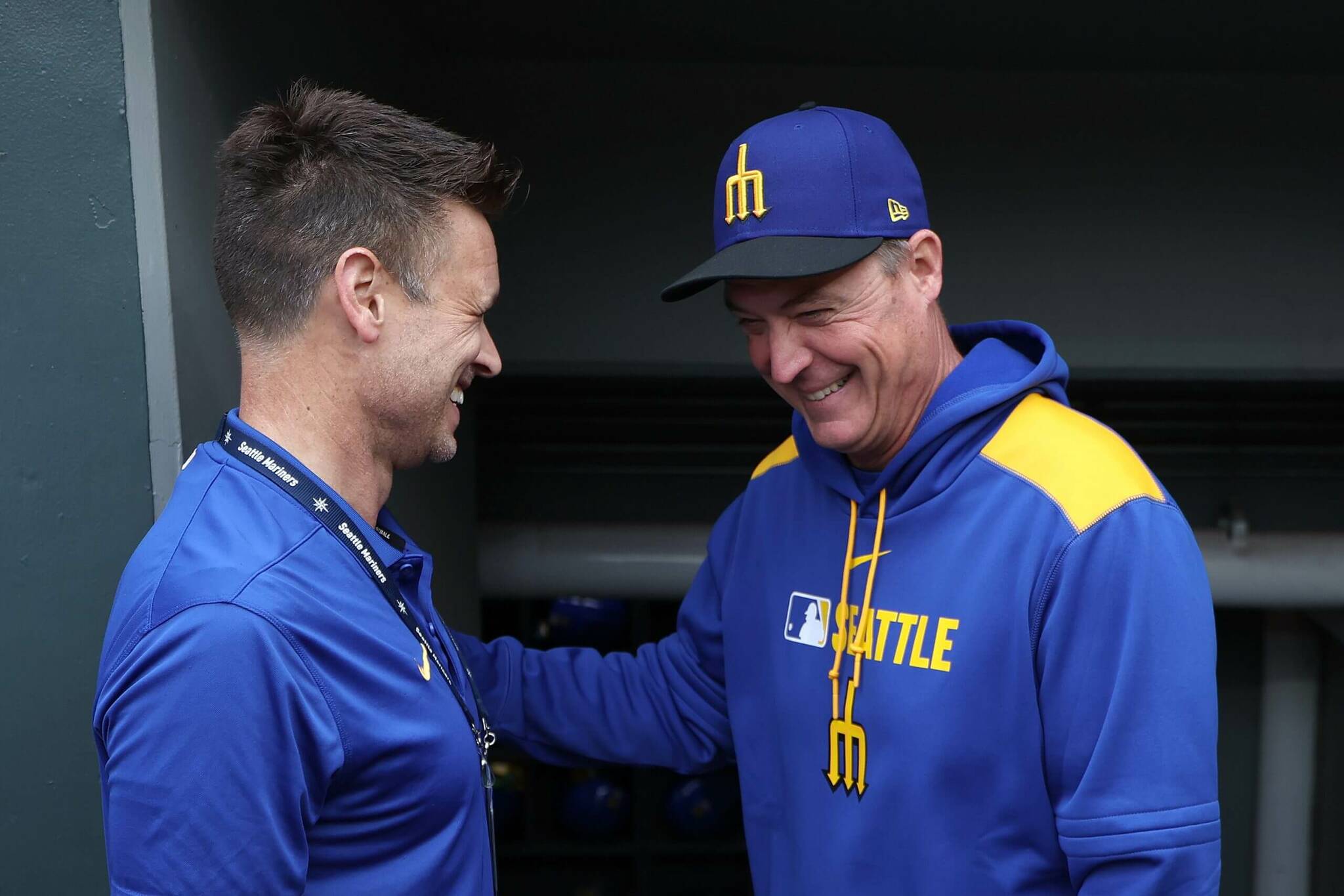 Mariners general manager Jerry Dipoto (left) and team manager Dan Wilson (right) remain optimistic despite recent slump. (Steph Chambers / Getty Images / The Athletic)