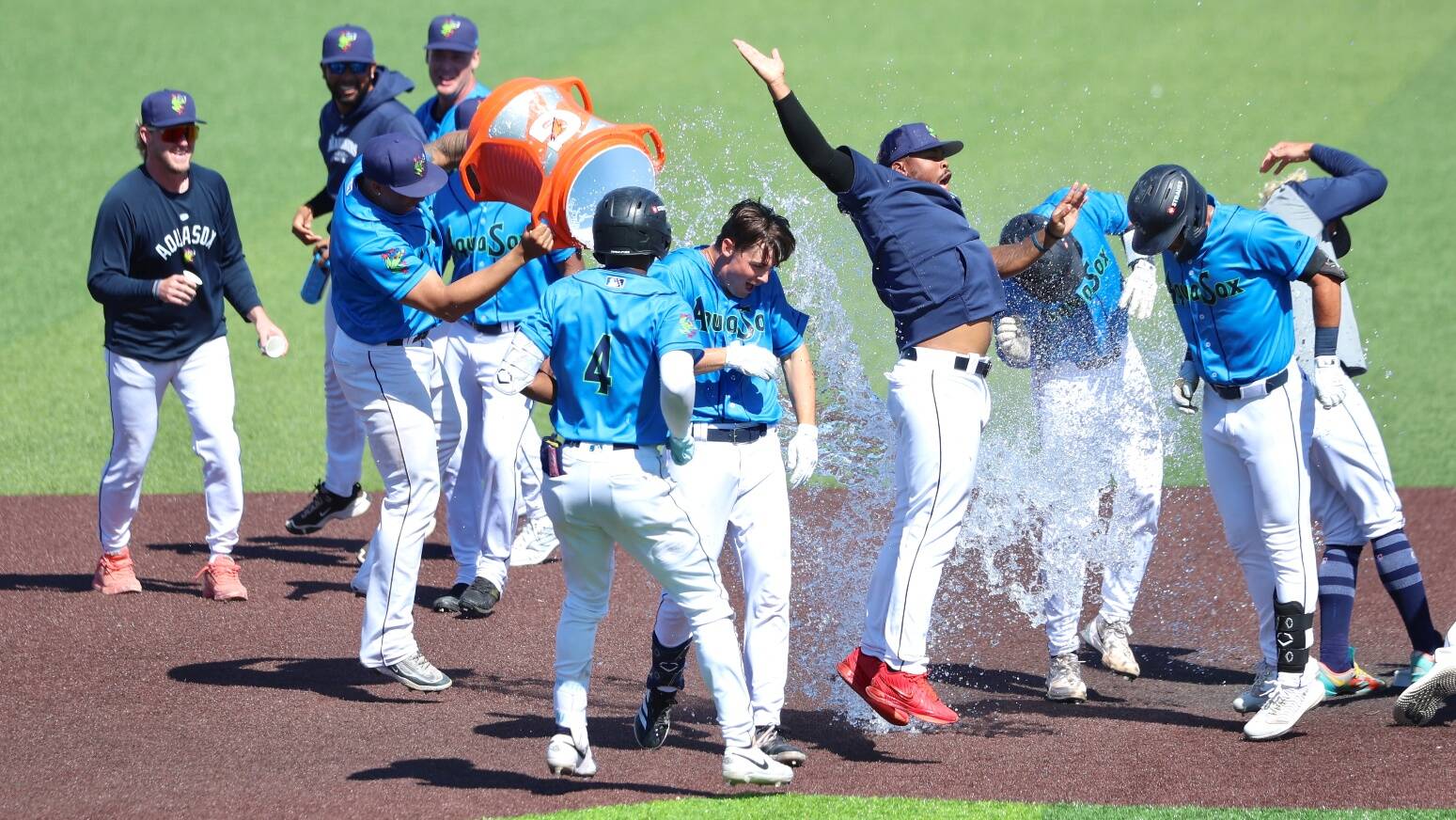 The Everett AquaSox celebrate a walk-off win against the Spokane Indians on Thursday, Aug. 21, 2025 at Funko Field in Everett, Washington. (Photo courtesy of Evan Morud / Everett AquaSox)