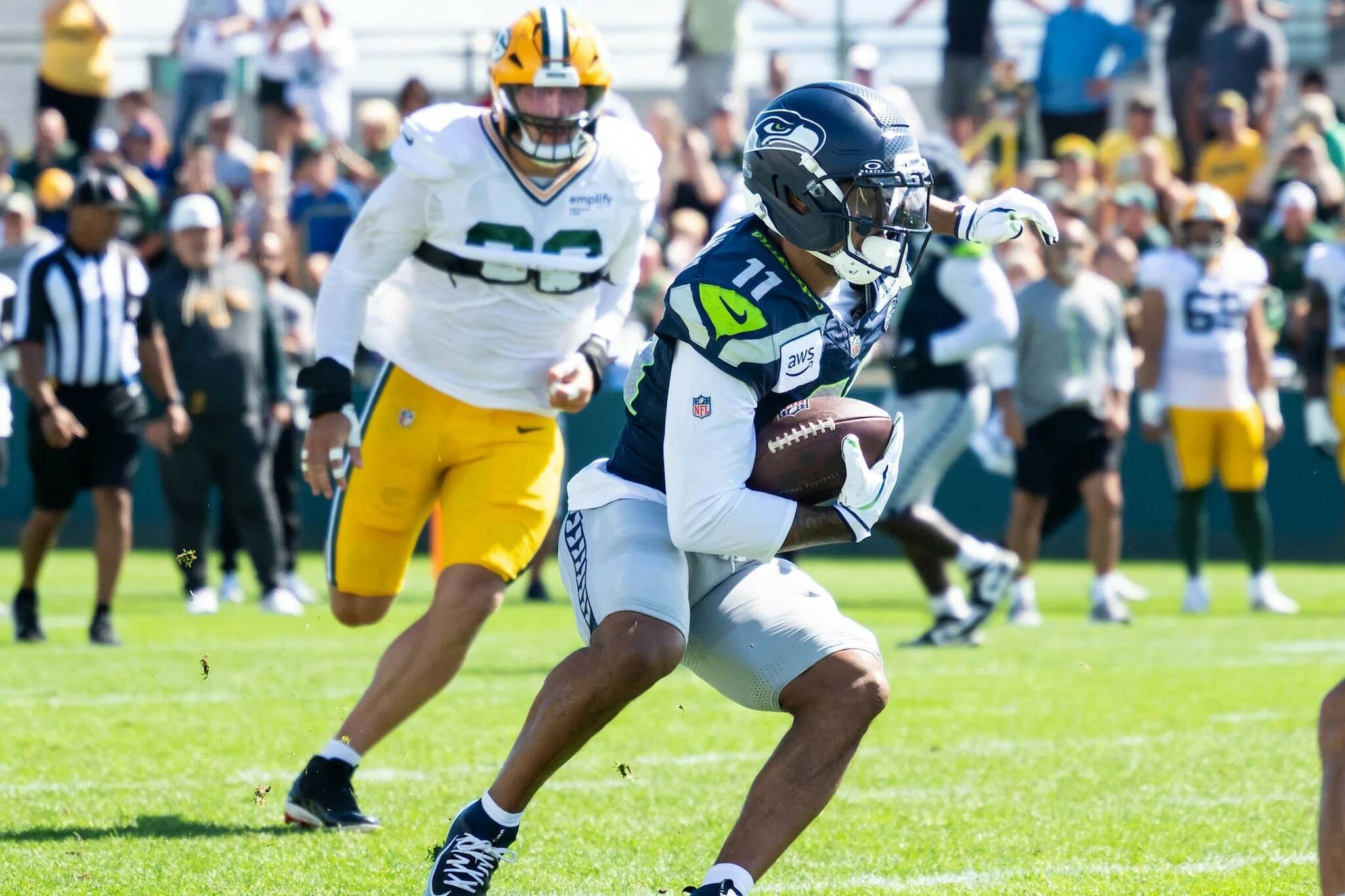 Seahawks wide receiver Jaxon Smith-Njigba (11) runs with the ball during a joint practice with the Green Bay Packers on Thursday, Aug. 21, 2025 at Ray Nitschke Field in Green Bay, Wisconsin (Photo courtesy of Rod Mar / Seattle Seahawks)