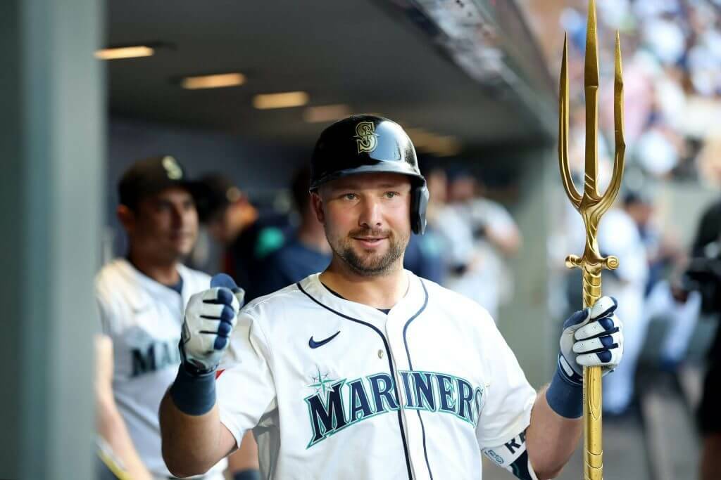 Cal Raleigh (29) of the Seattle Mariners celebrates after his solo home run, his 50th of the regular season, against the San Diego Padres during the first inning at T-Mobile Park on Monday, Aug. 25, 2025, in Seattle. (Steph Chambers / Getty Images / Tribune News Services)