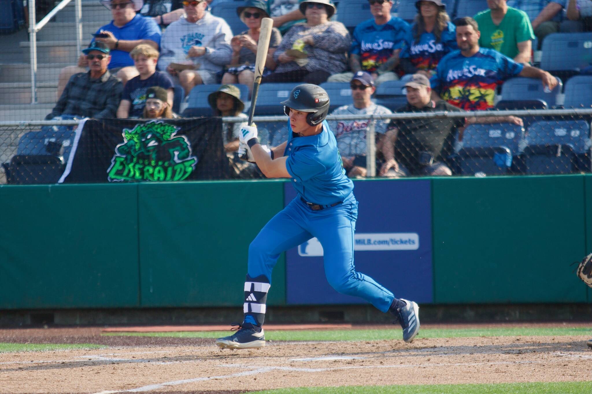 AquaSox outfielder Jonny Farmelo watches the ball off his bat during Everett’s 7-5 win against the Eugene Emeralds at Funko Field on Aug. 31, 2025. (Joe Pohoryles / The Herald)