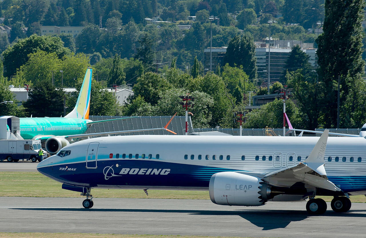 A Boeing 737 Max 10 prepares to take off in Seattle in 2021. (Chona Kasinger / Bloomberg)