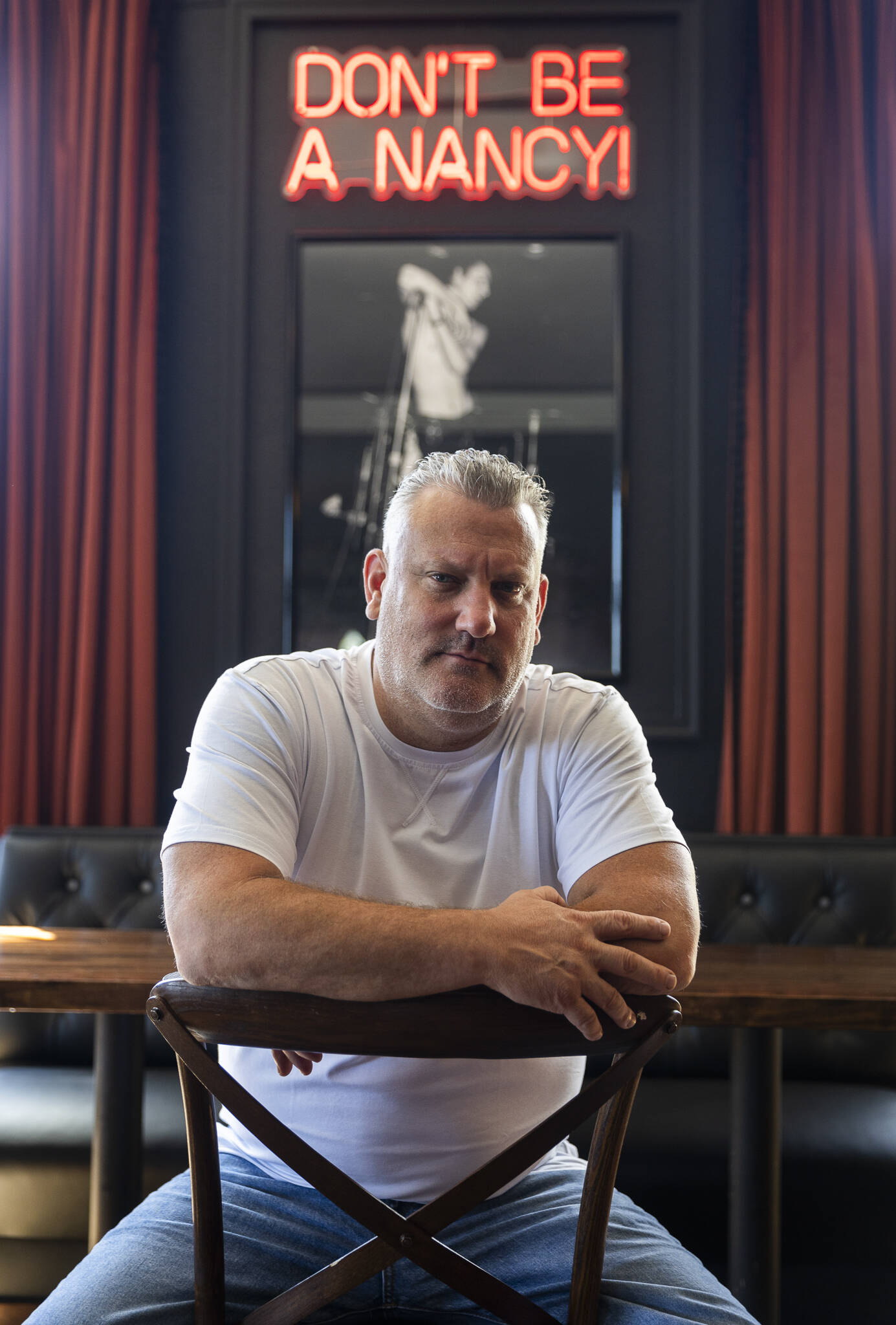 John Carswell inside El Sid, a punk-rock inspired cocktail bar and one of the final pieces of Carswells renovation of the APEX building on Tuesday, Aug. 12, 2025 in Everett, Washington. (Olivia Vanni / The Herald)