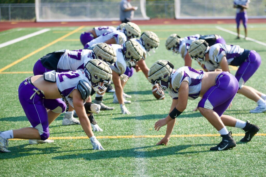 The Lake Stevens offensive and defensive lines set up for a practice rep at Lake Stevens High School on Sept. 2, 2025. (Joe Pohoryles / The Herald)