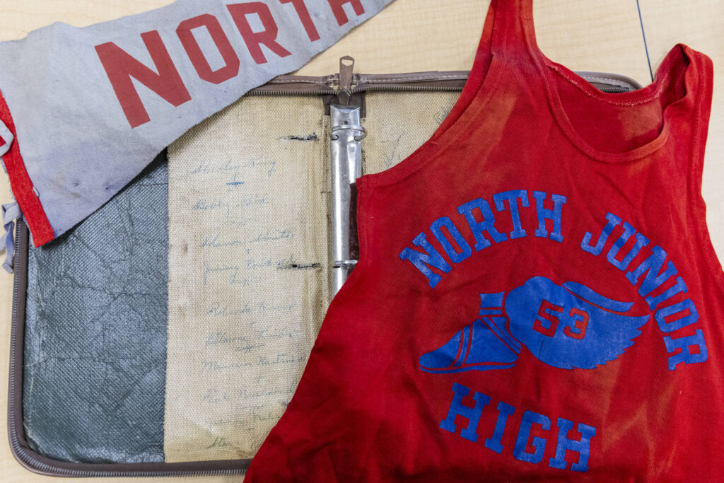 A binder, a track jersey and a pennant flag the school found and received on Tuesday, Sept. 9, 2025 in Everett, Washington. (Olivia Vanni / The Herald)
