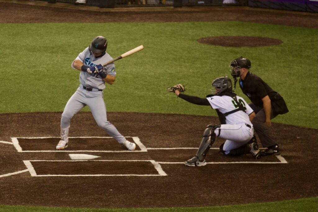 AquaSox infielder Charlie Pagliarini leans back to avoid an inside pitch during Everett’s 9-6 extra-innings win against Eugene in Game 1 of the Northwest League Championship Series at PK Park on Sept. 9, 2025. (Joe Pohoryles / The Herald)
