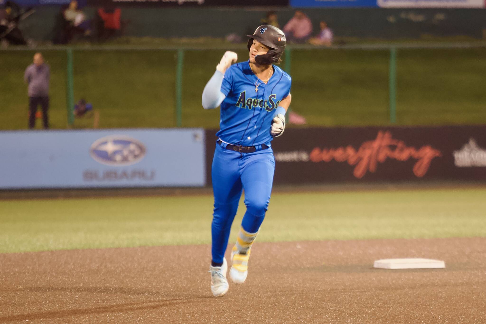 AquaSox third baseman Luis Suisbel pumps his fist rounding second base after hitting the go-ahead, two-run home run to help Everett beat the Eugene Emeralds 6-3 in Game 4 to clinch the 2025 Northwest League Championship at Funko Field on Sept. 13, 2025. (Joe Pohoryles / The Herald)