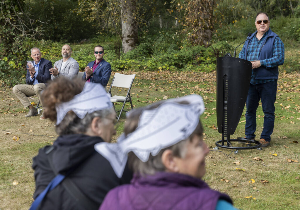 PUD Commissioner Sid Logan speaks at the ribbon cutting for a new channel at Osprey Park on Thursday, Sept. 18, 2025 in Sultan, Washington. (Olivia Vanni / The Herald)
