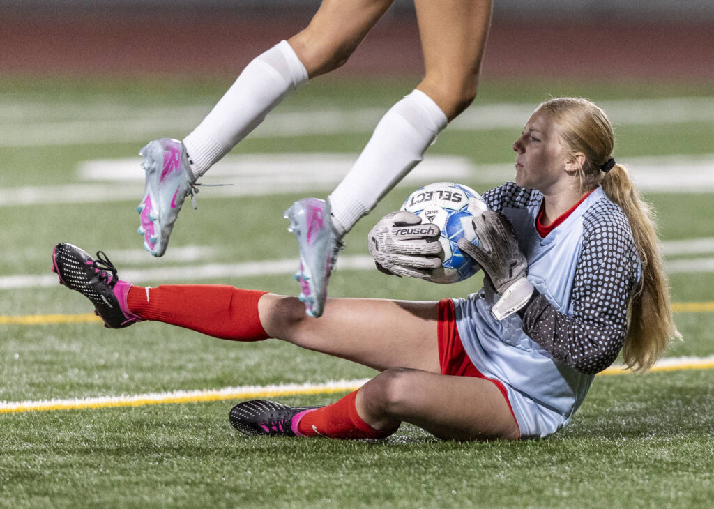 Stanwood&rsquo;s Chloe Lally comes out to make a save during the game against Snohomish on Sept. 25, 2025 in Stanwood, Washington. (Olivia Vanni / The Herald)
