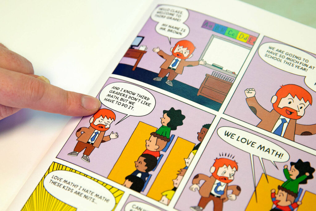 Challenger Elementary teacher Ian Brown points out his character in &ldquo;I Hate Math.&rdquo; (Herald file photo)
