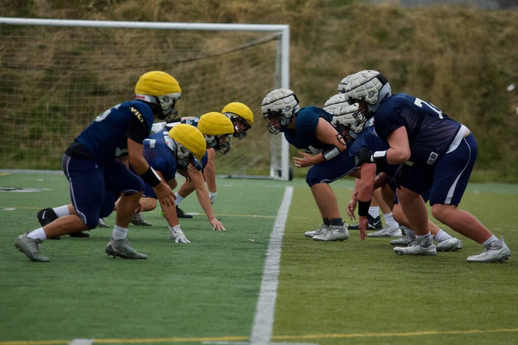 The Glacier Peak offensive and defensive lines set up for a rep during the Grizzlies’ practice at Glacier Peak High School in Snohomish on Sept. 30, 2025. (Joe Pohoryles / The Herald)
