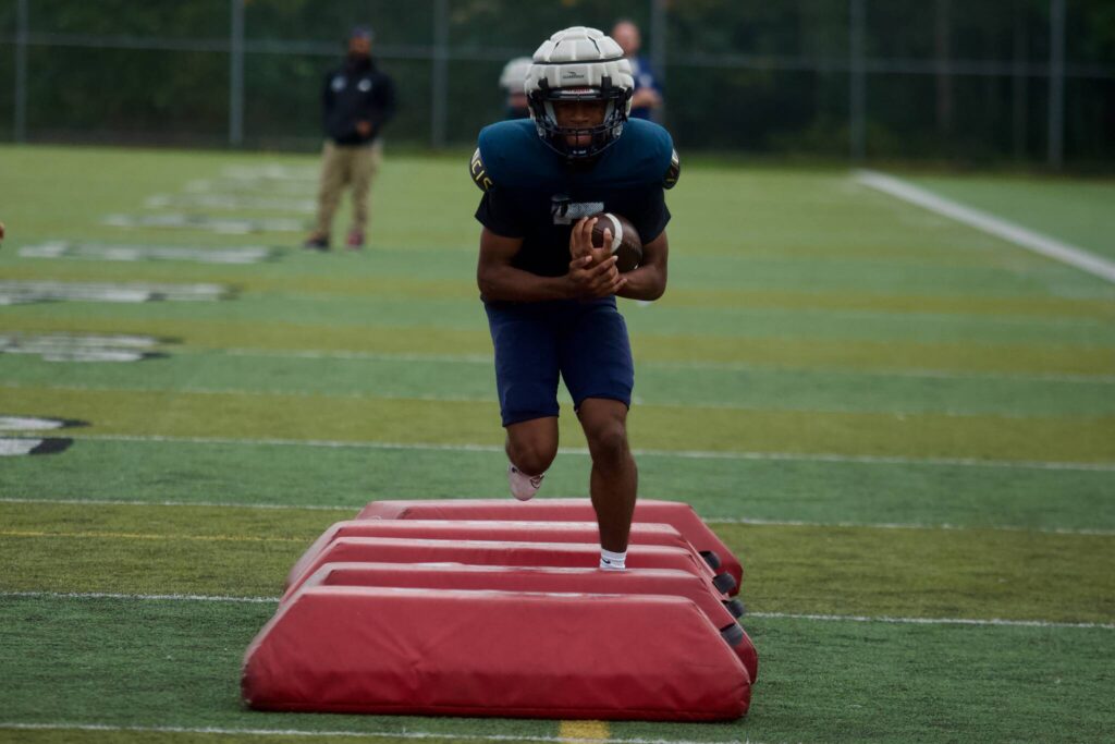 Glacier Peak senior Isaiah Owens carries the ball in a drill during the Grizzlies’ practice at Glacier Peak High School in Snohomish on Sept. 30, 2025. (Joe Pohoryles / The Herald)
