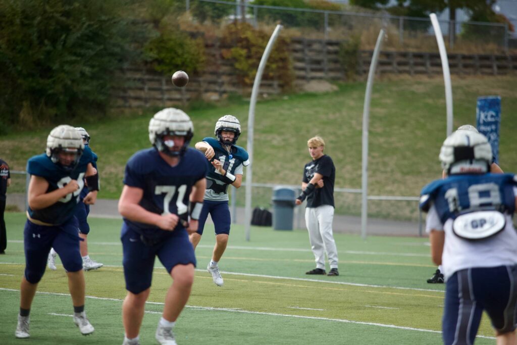 Glacier Peak sophomore Oliver Setterberg releases the ball during the Grizzlies’ practice at Glacier Peak High School in Snohomish on Sept. 30, 2025. (Joe Pohoryles / The Herald)
