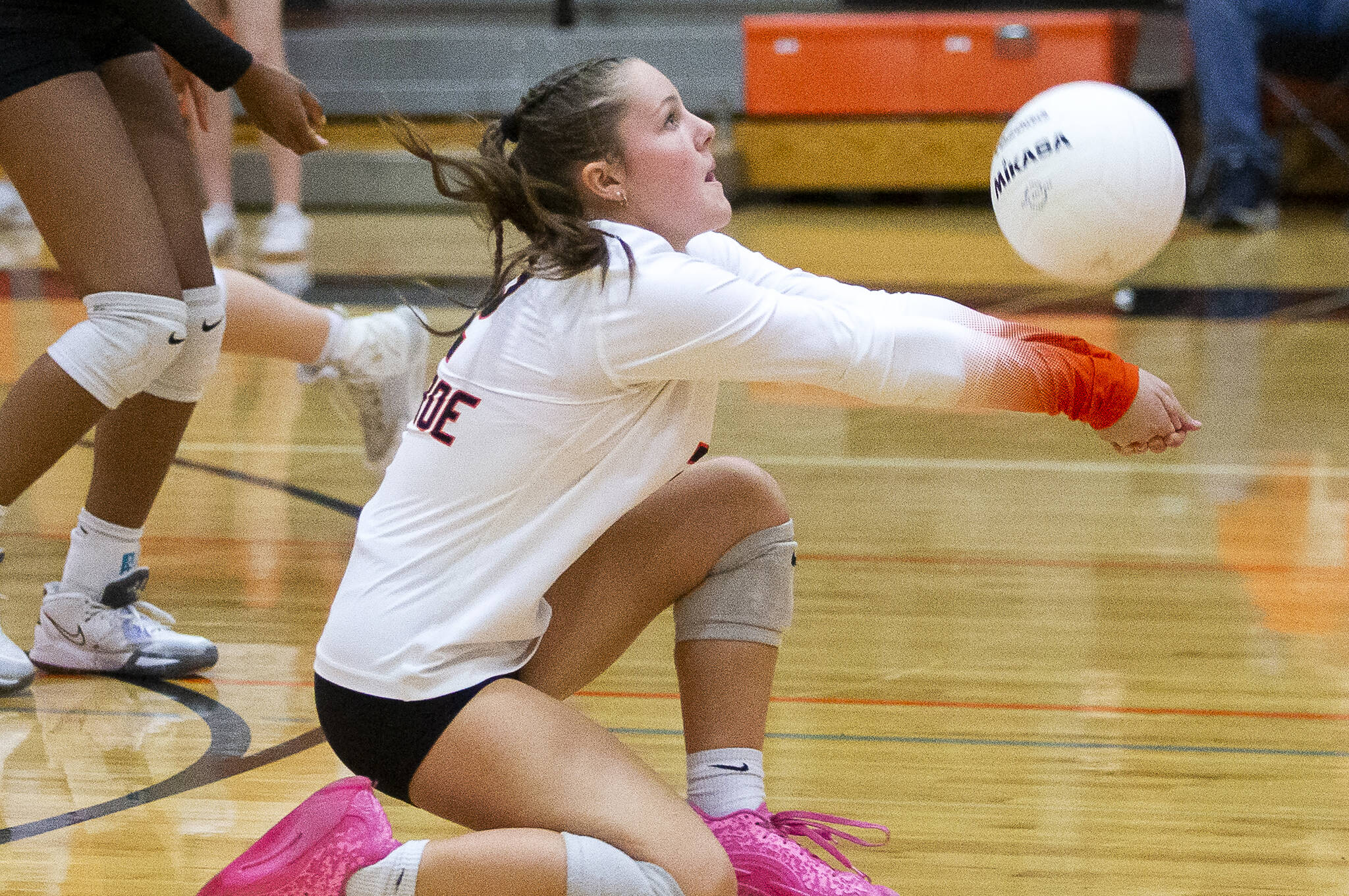Monroe’s Maddie Walker digs the ball during the game against Snohomish on Wednesday, Oct. 16, 2024 in Monroe, Washington. (Olivia Vanni / The Herald)