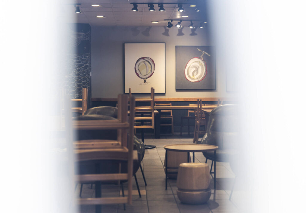 Furniture is visible inside of a recently closed Starbucks on the corner of Highway 99 and 220th Street Southwest on Oct. 1, 2025 in Edmonds, Washington. (Olivia Vanni / The Herald)
