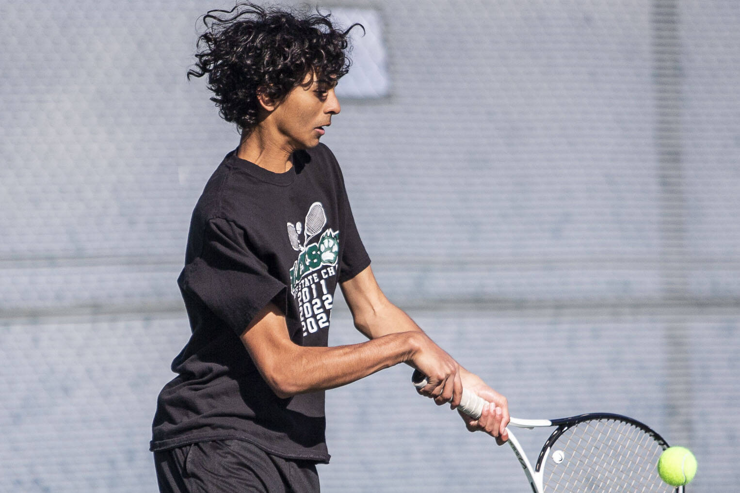 Arhan Sinha runs after the ball during the district championship doubles match on Thursday, Oct. 24, 2024 in Snohomish, Washington. (Olivia Vanni / The Herald)