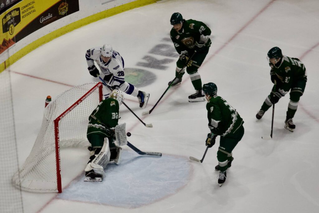 Silvertips goalie Finn Werner makes a stop during his WHL debut, a 9-4 win for Everett against Victoria at Angel of the Winds Arena on Oct. 4, 2025. (Joe Pohoryles / The Herald)
