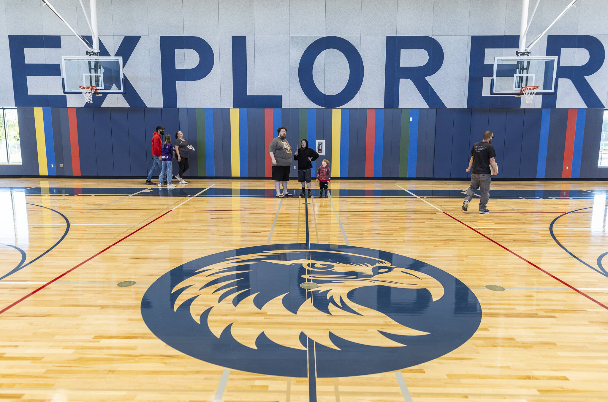 People walk through Explorer Middle School’s new gymnasium during an open house on Oct. 7, 2025 in Everett, Washington. (Olivia Vanni / The Herald)